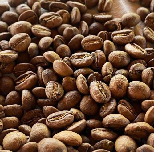a pile of brown coffee beans piled up at Granja del Cafe Hotel y Centro de convenciones in Venecia