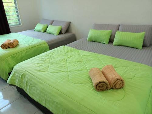 Cama o camas de una habitación en D' Surya Lavender Inn
