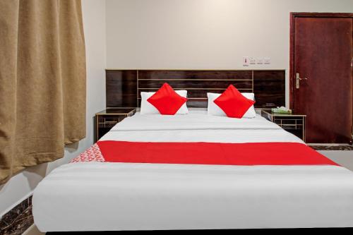 เตียงในห้องที่ أويو 590 ديالا للوحدات السكنية