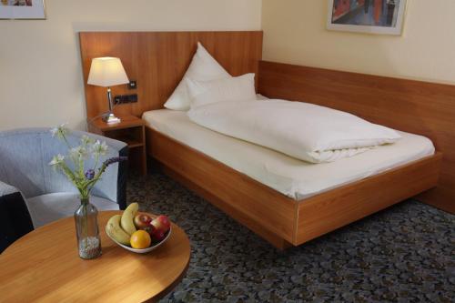 Katil atau katil-katil dalam bilik di Hotel Restaurant Fischer