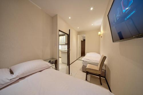 Posteľ alebo postele v izbe v ubytovaní Villa la Val, Apartamenty Wałbrzych