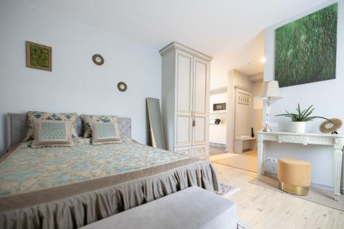 En eller flere senge i et værelse på Baltic Sea Dunes Apartments