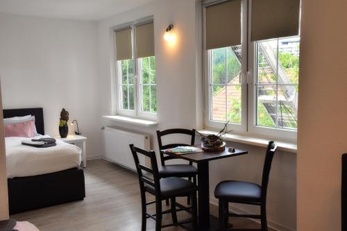 Postel nebo postele na pokoji v ubytování Hotel Rosenhof Braunlage