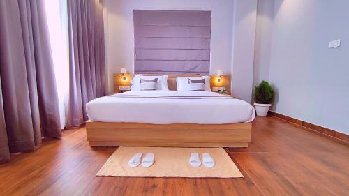 Cama o camas de una habitación en Sshubh Hotel Nathdwara