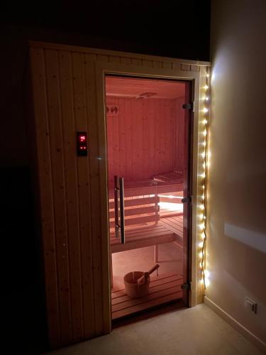 Ein Bett oder Betten in einem Zimmer der Unterkunft Na Kaszubskim Wzgórzu z sauną i banią