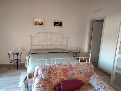 מיטה או מיטות בחדר ב-B&B La Casa di Giuliana
