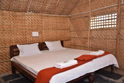 Katil atau katil-katil dalam bilik di Dream Mango Hampi