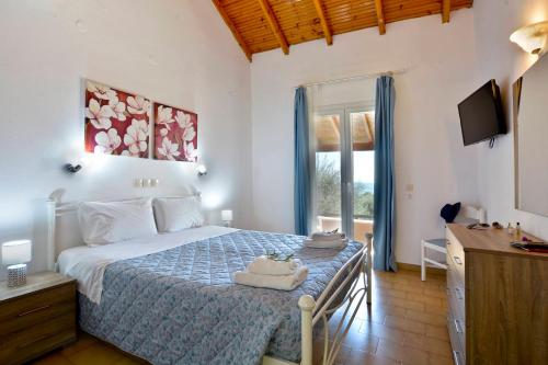 Posteľ alebo postele v izbe v ubytovaní Renata Rooms & Studios