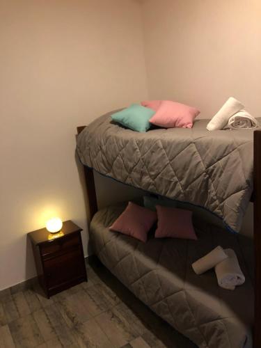 Una cama o camas cuchetas en una habitación  de De los Horneros