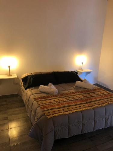 Una cama o camas en una habitación de De los Horneros