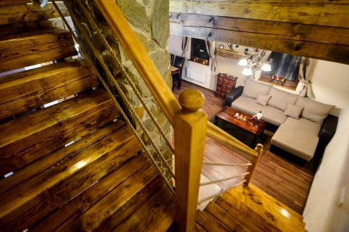 an overhead view of a staircase in a living room at Wellness Chata Chmaroška - Telgárt Resort in Telgárt
