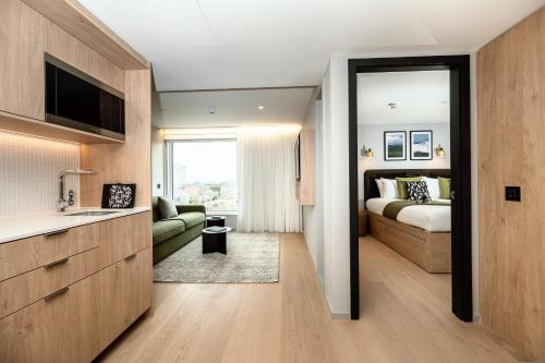 Ένα ή περισσότερα κρεβάτια σε δωμάτιο στο Wilde Aparthotels London Aldgate Tower Bridge