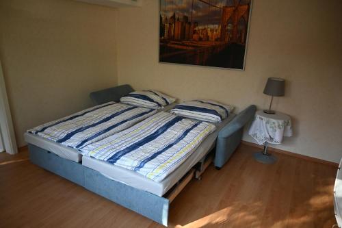 Llit o llits en una habitació de 2 Zi-Appartment mit Gartennutzung
