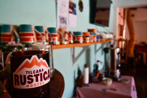 a pint of beer sitting on a table at Tilcara Rustica Hostel in Tilcara