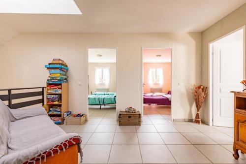 a bedroom with a bed and two mirrors at Les 3 Edelweiss - GITE 1 OU GITE 2 in Arette