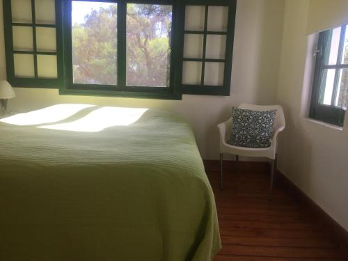 En eller flere senge i et værelse på Private guesthouse & pool