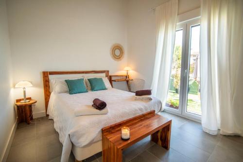 Posteľ alebo postele v izbe v ubytovaní La Ren Lecrés Apartamento piscina jardin