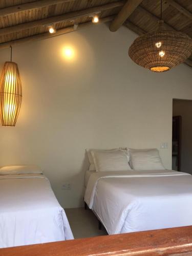 Katil atau katil-katil dalam bilik di Calypso INN