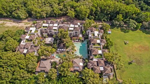 an aerial view of a house with a pool at Swim Out Apartments in Triton Street Beachfront Resort Palm Cove in Palm Cove