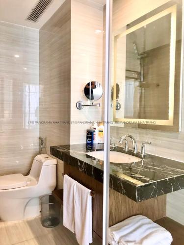 a bathroom with a toilet and a sink at Panorama Nha Trang Inn in Nha Trang