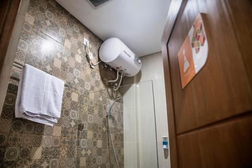 Koupelna v ubytování Tuju Arteri Pods