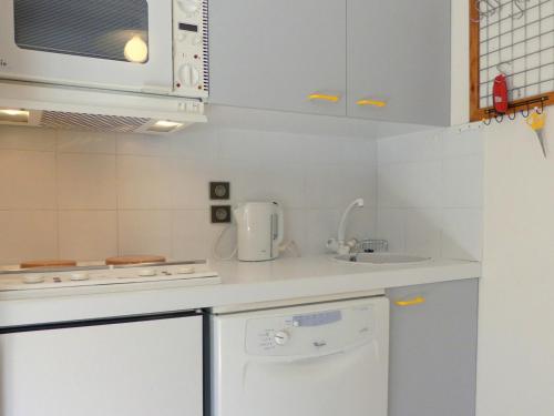 Kuchyň nebo kuchyňský kout v ubytování Appartement Méribel, 3 pièces, 5 personnes - FR-1-182-117