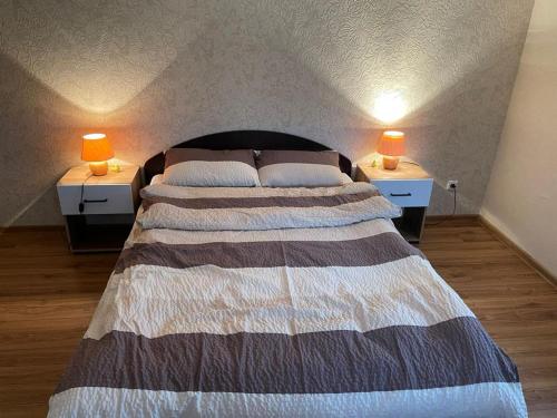 Säng eller sängar i ett rum på Sodyba Miegėnuose