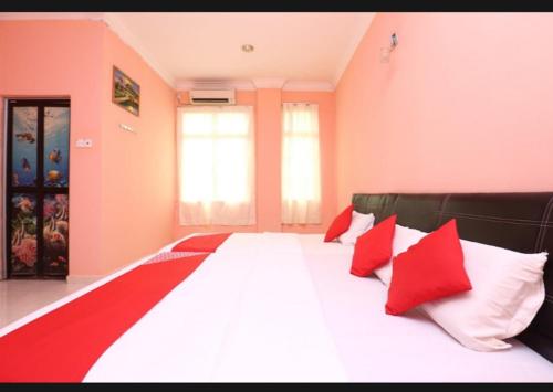 Кровать или кровати в номере SA VILLA HOLIDAY INN