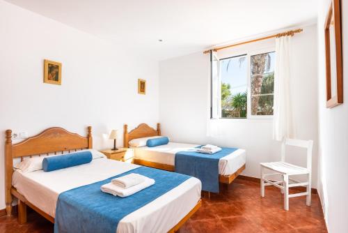 Postel nebo postele na pokoji v ubytování Villa Xiscu by Mauter Villas