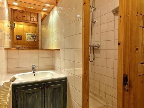 a bathroom with a sink and a shower at Appartement La Plagne, 2 pièces, 4 personnes - FR-1-455-122 in La Plagne