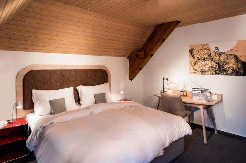Postel nebo postele na pokoji v ubytování KONCEPT HOTEL Löie