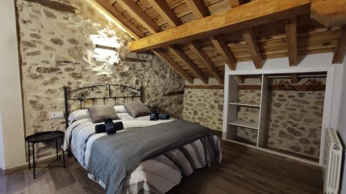 Ένα ή περισσότερα κρεβάτια σε δωμάτιο στο CASA GELA. Entorno rural
