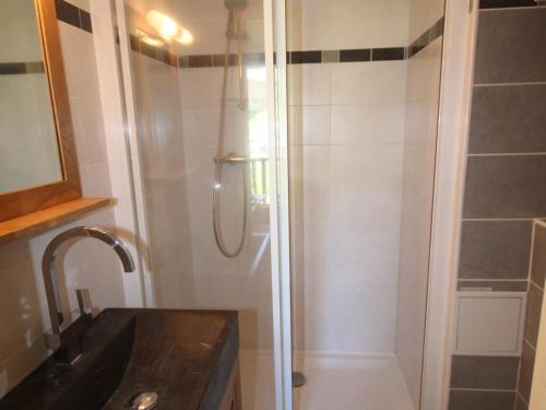 a shower with a glass door in a bathroom at Studio Les Saisies, 1 pièce, 2 personnes - FR-1-293-245 in Hauteluce