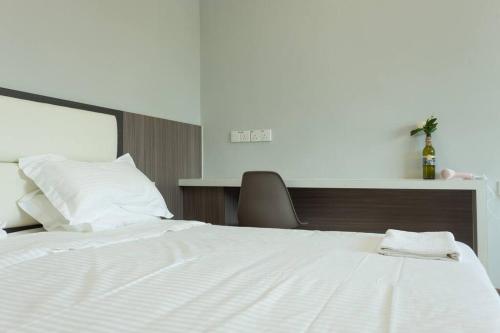 Ένα ή περισσότερα κρεβάτια σε δωμάτιο στο Hin Loi Homes