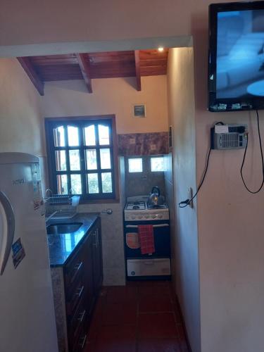 Dapur atau dapur kecil di Cabañas La Belen