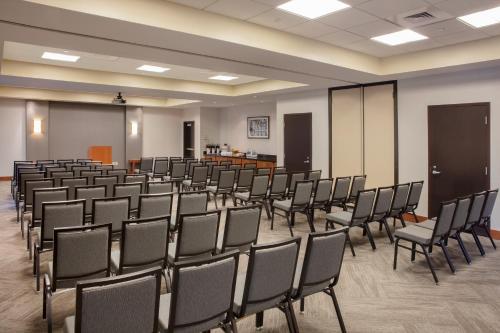 a room with rows of chairs in a classroom at Hyatt Place Reno/Tahoe Airport in Reno