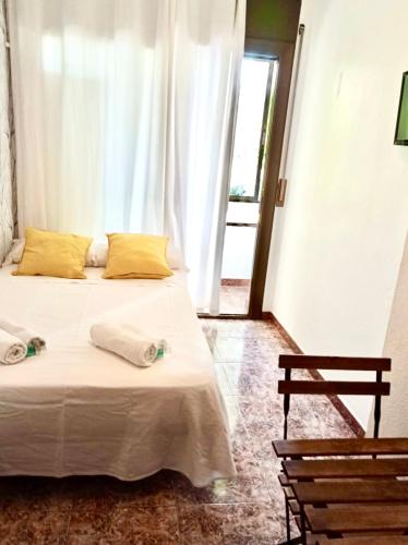 Ένα ή περισσότερα κρεβάτια σε δωμάτιο στο Fira Guest House