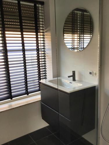 Koupelna v ubytování Chic appartement in Sas van Gent