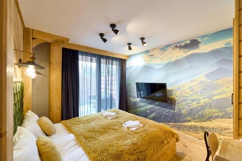 Aparthotel Giewontにあるテレビまたはエンターテインメントセンター
