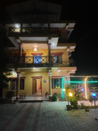 a building with a sign that reads national park at night at Hotel National Park Sauraha- Homely Stay and Peaceful Location with Jungle Safari arrangements in Sauraha