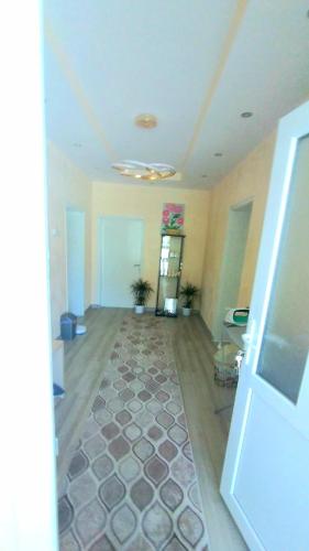 an empty room with a room with a room at Rose & Water Guest house in Pavel Banya