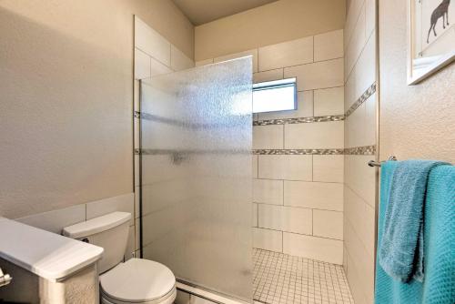 a bathroom with a shower and a toilet at Docs Retreat in Ruidoso Downs with Mtn Views in Ruidoso Downs