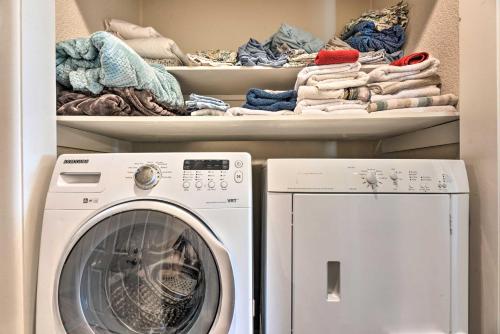a laundry room with a washing machine and towels at Docs Retreat in Ruidoso Downs with Mtn Views in Ruidoso Downs