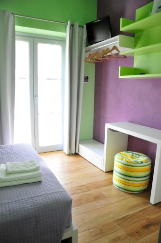Una cama o camas en una habitación de Ai Lecci in Centro