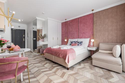 Postel nebo postele na pokoji v ubytování Golden Line Apartments