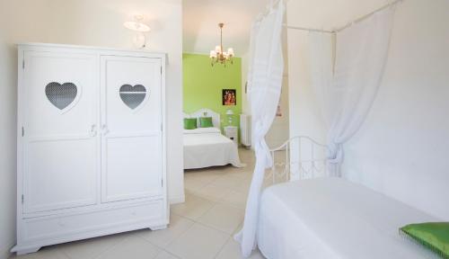 Postel nebo postele na pokoji v ubytování B&B The Divine