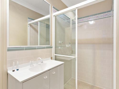 a bathroom with a sink and a shower at Ajax Avenue 6 in Nelson Bay