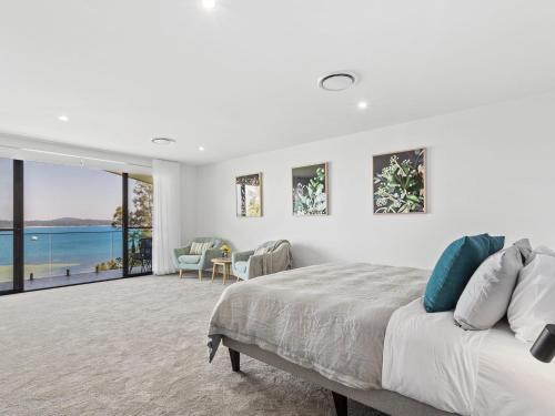 Postel nebo postele na pokoji v ubytování Maggies Place 46B Danalene Parade