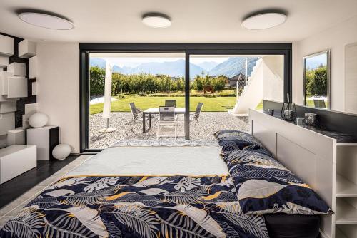 Ένα ή περισσότερα κρεβάτια σε δωμάτιο στο Alps Spirits - B&B Studio