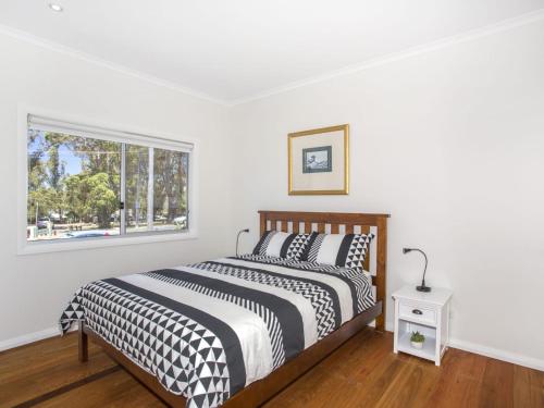 A bed or beds in a room at HARBOUR BREEZE - ULLADULLA